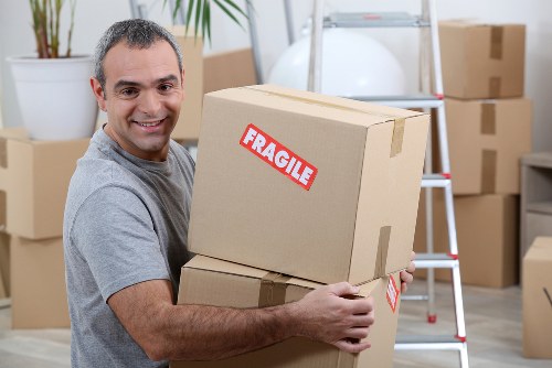 Moving team handling removals in a Maida Vale street