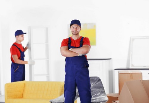 Student removals team planning a move in Maida Vale residential street