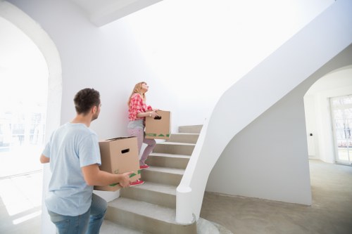 Mover wearing PPE during a safe removals job in Maida Vale
