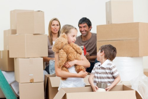 Prepared moving boxes and packed household items for a Maida Vale removal